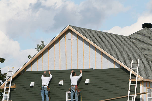 Professional Emergency Siding Repair technician working in Green Bay, VA
